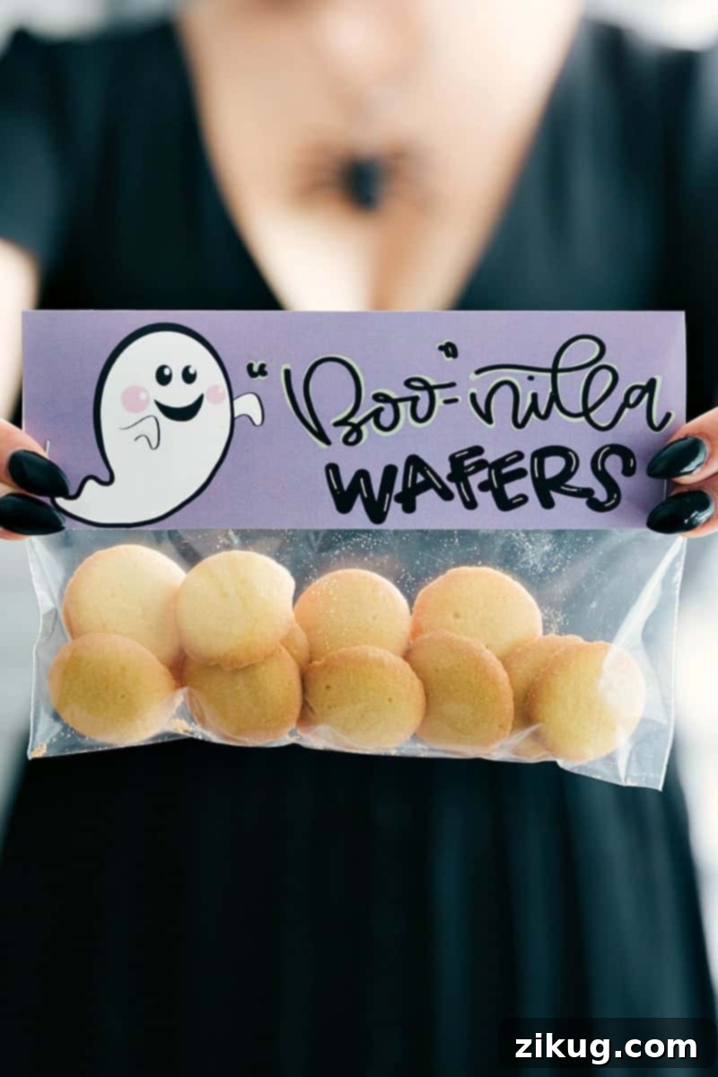 Boonilla Wafers Halloween Treat Bags Boonilla Wafers free Halloween gift idea featuring mini vanilla wafers in a treat bag with a themed topper.