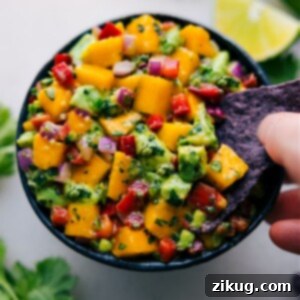 Delicious Fresh Mango Salsa, garnished with cilantro.