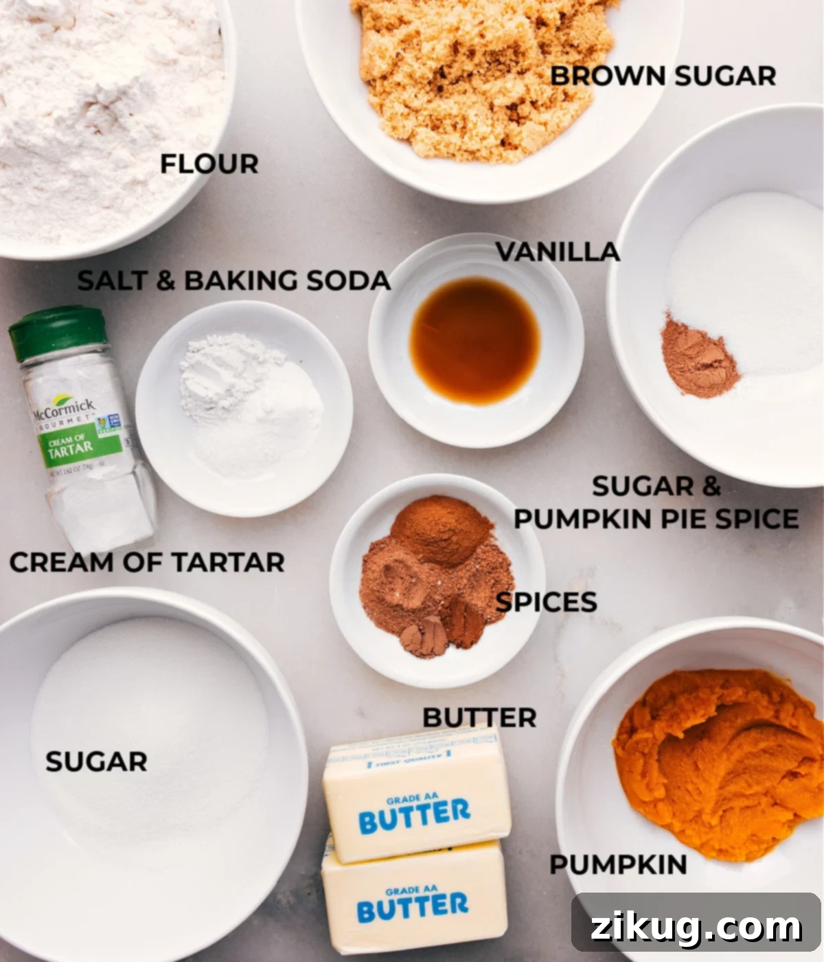 Ingredients Ready for Baking: Spices, Butter, Sugar, Flour All the essential ingredients for making pumpkin snickerdoodle cookies laid out neatly: spices, butter, sugar, flour, and pumpkin puree, ready to be combined.
