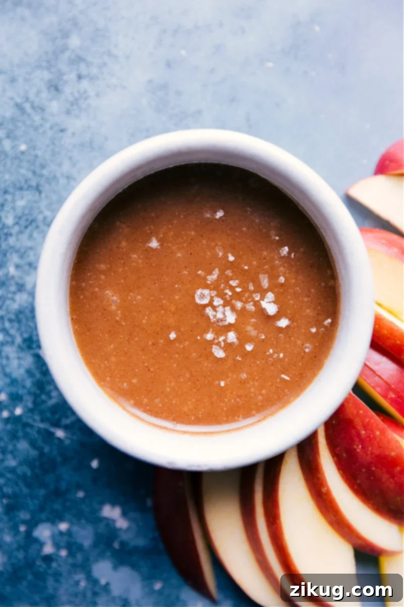 Wholesome Caramel Drizzle 2 A beautiful bowl of creamy, golden Healthy Caramel Sauce, ready for dipping or drizzling over your favorite treats.
