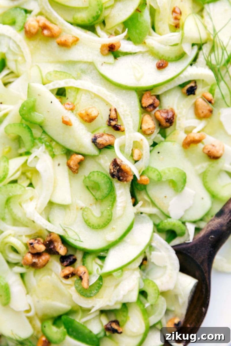 Crisp Apple Fennel Salad 2 Close-up shot of thinly sliced apples, fennel, and celery in a bowl