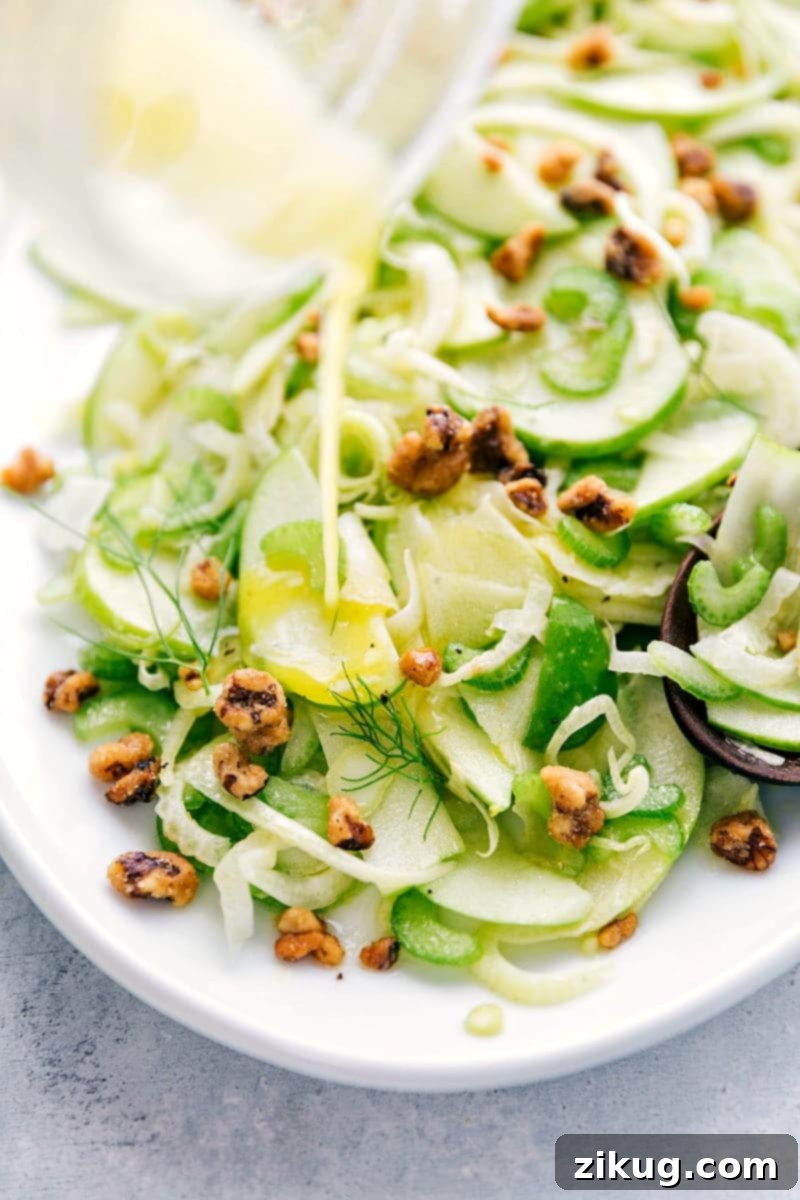 Crisp Apple Fennel Salad 3 Close-up shot of the finished Apple Fennel Salad with walnuts and parmesan