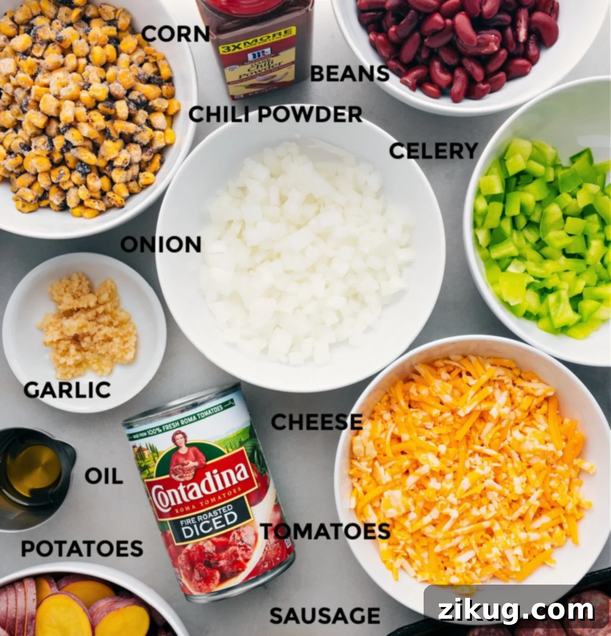 Ingredients In Crockpot Cowboy Casserole Prepped All the ingredients in this recipe are prepped for easy assembly, including the veggies, cheese, tomatoes, potatoes, oil, corn, beans, and seasonings.