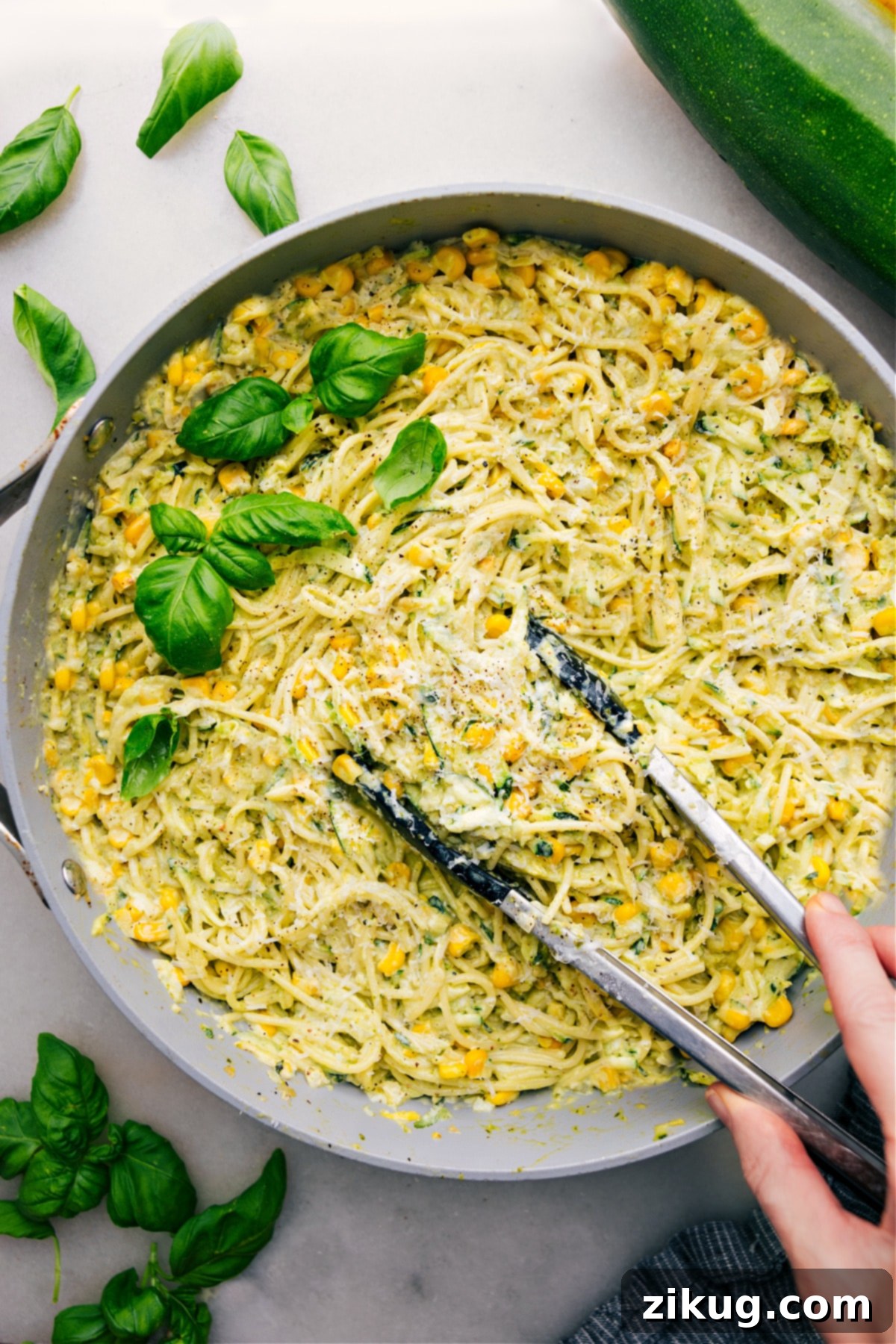Zucchini Pasta Sauce over spaghetti in a pot ready to be served for dinner.