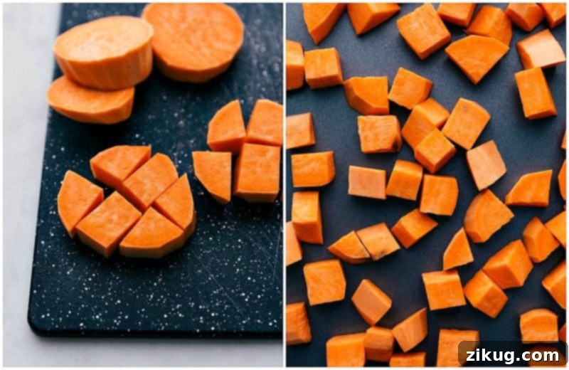 Cutting a sweet potato into equal-sized 1/2 inch cubes for roasting is essential for even cooking and optimal texture. Sweet potato rounds meticulously chunked into equal sizes, ready for perfect roasting.