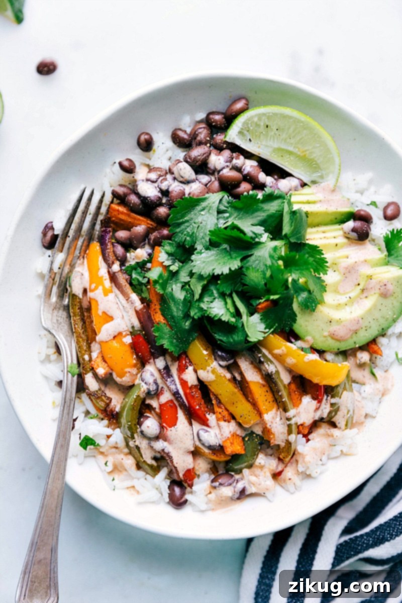 These Vegetarian Fajitas are sure to be a crowd pleaser! A beautifully plated serving of Vegetarian Fajitas, ready to impress any crowd.
