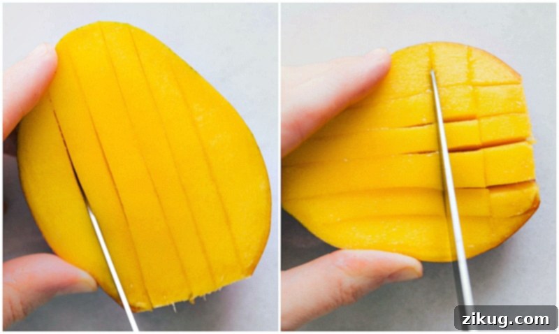 How to remove the remaining mango fruit from the pit area efficiently. Image of a mango's remaining narrow sides being sliced to remove all fruit from around the pit.