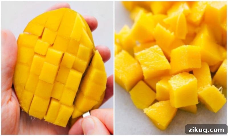 Method for cubing a mango by making cross-hatch cuts. Image showing horizontal cuts being made into the vertically sliced mango flesh to create cubes.