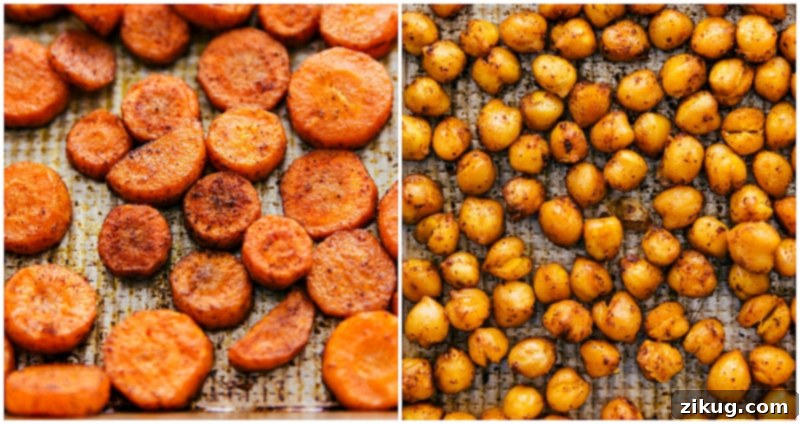A close-up shot of roasted carrots and chickpeas, beautifully seasoned and caramelized on a baking sheet, ready for the salad.