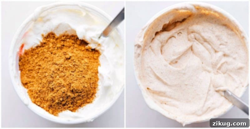 The best and easiest 7 Layer Bean Dip recipe Taco seasoning being generously mixed into sour cream, creating a flavorful layer for the 7-Layer Bean Dip.