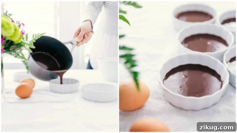 Tuxedo Crème Brûlée is a chocolatey twist on the traditional crème brûlée recipe. This dessert has a chocolate ganache bottom, creamy custard filling, and a caramelized sugar topping. Top these brulée with fresh berries and chocolate curls for a delicious show-stopping dessert. Recipe via ChelseasMessyApron.com #cremebrulee #tuxedo #ganache #French #dessert #elegant Image of the chocolate layer being poured into the ramekins for these Tuxedo Crèmes Brûlée.
