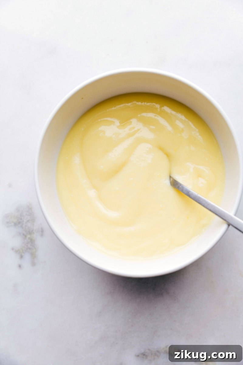 The Best Custard Filling Recipe Custard filling for banana crepes in a bowl, looking creamy and delicious.