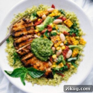 Pesto Chicken 3 Pesto Chicken with chicken, corn and white bean salsa, and pesto on top.