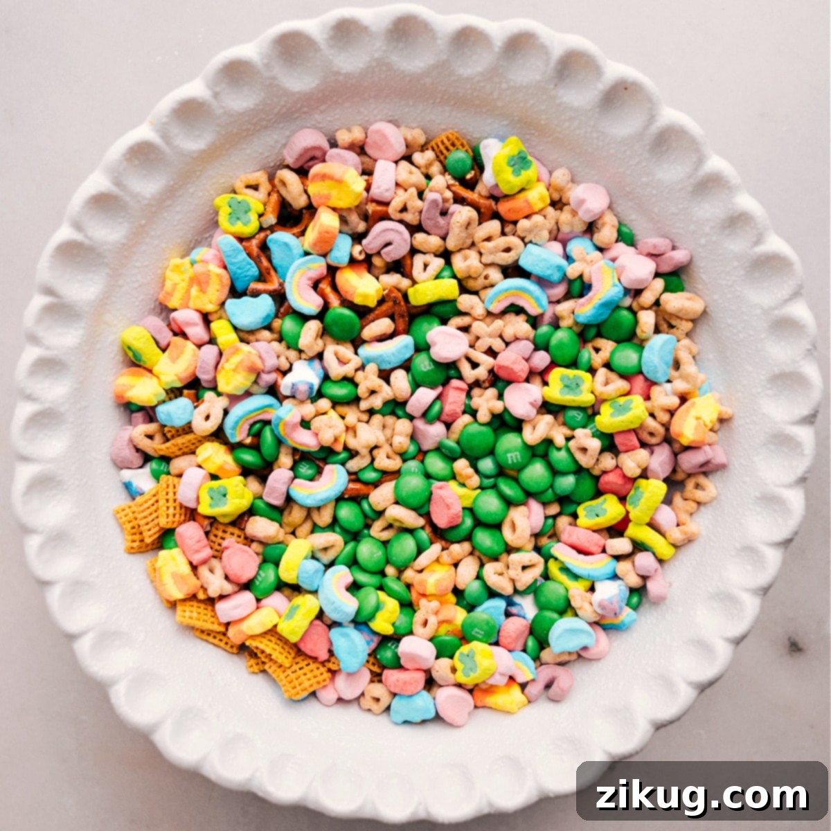 It Takes Minutes To Make This Leprechaun Bait All the dry ingredients for Leprechaun Bait, including cereals, pretzels, and candies, are combined in a large bowl and ready to mix with melted white chocolate.