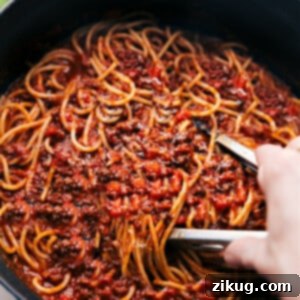 Spaghetti Bolognese recipe in the pot, rich and hearty.