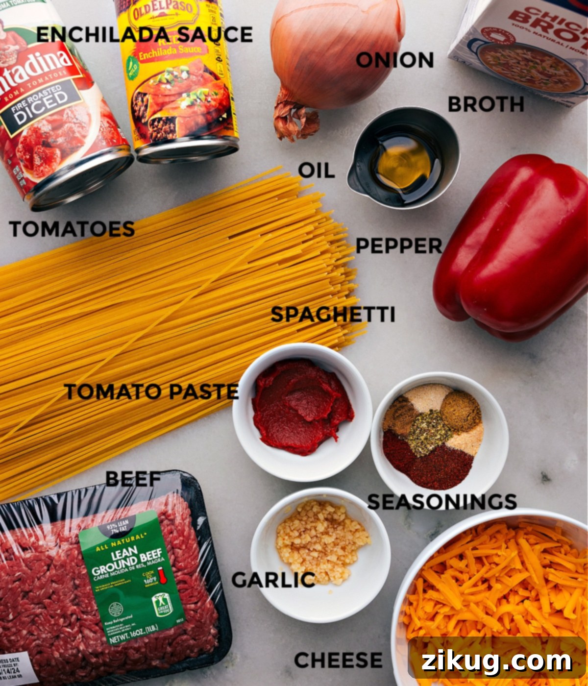 Essential Ingredients for Crafting Your One-Pot Taco Spaghetti A vibrant display of all the fresh, high-quality ingredients required for this Taco Spaghetti recipe, meticulously prepped and arranged for effortless assembly, including finely diced vegetables, lean ground beef, an array of spices, and rich sauces.