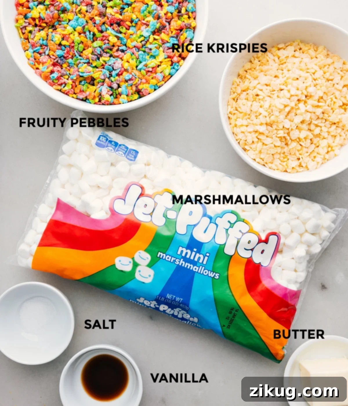 The essential ingredients for Fruity Pebble Rice Krispies Treats laid out: cereal, mini marshmallows, butter, salt, and vanilla extract.