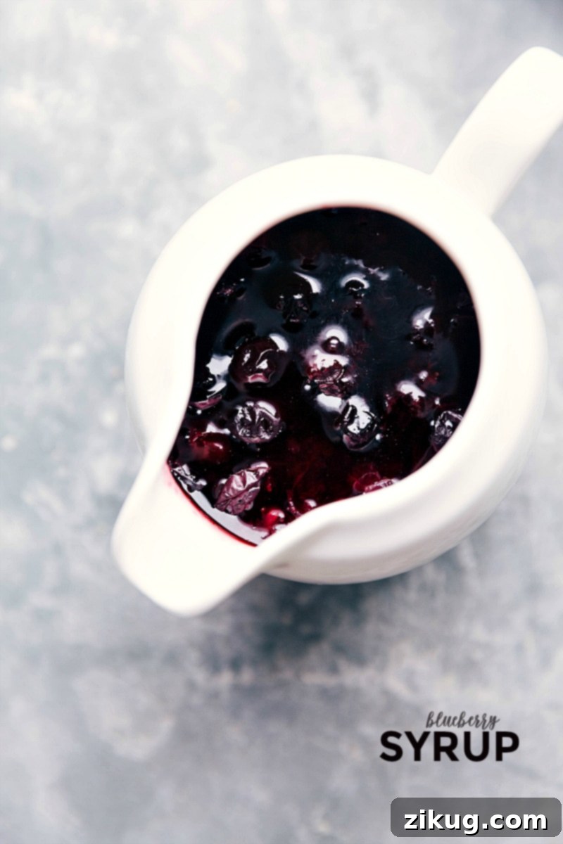 Fresh blueberries, a little bit of sugar, cornstarch, vanilla, and water make for the most incredible Blueberry Syrup! Ready-to-serve Blueberry Syrup.