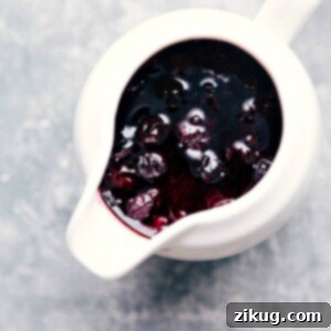 Liquid Blueberry Sunshine 3 Freshly made blueberry syrup in a glass jar.