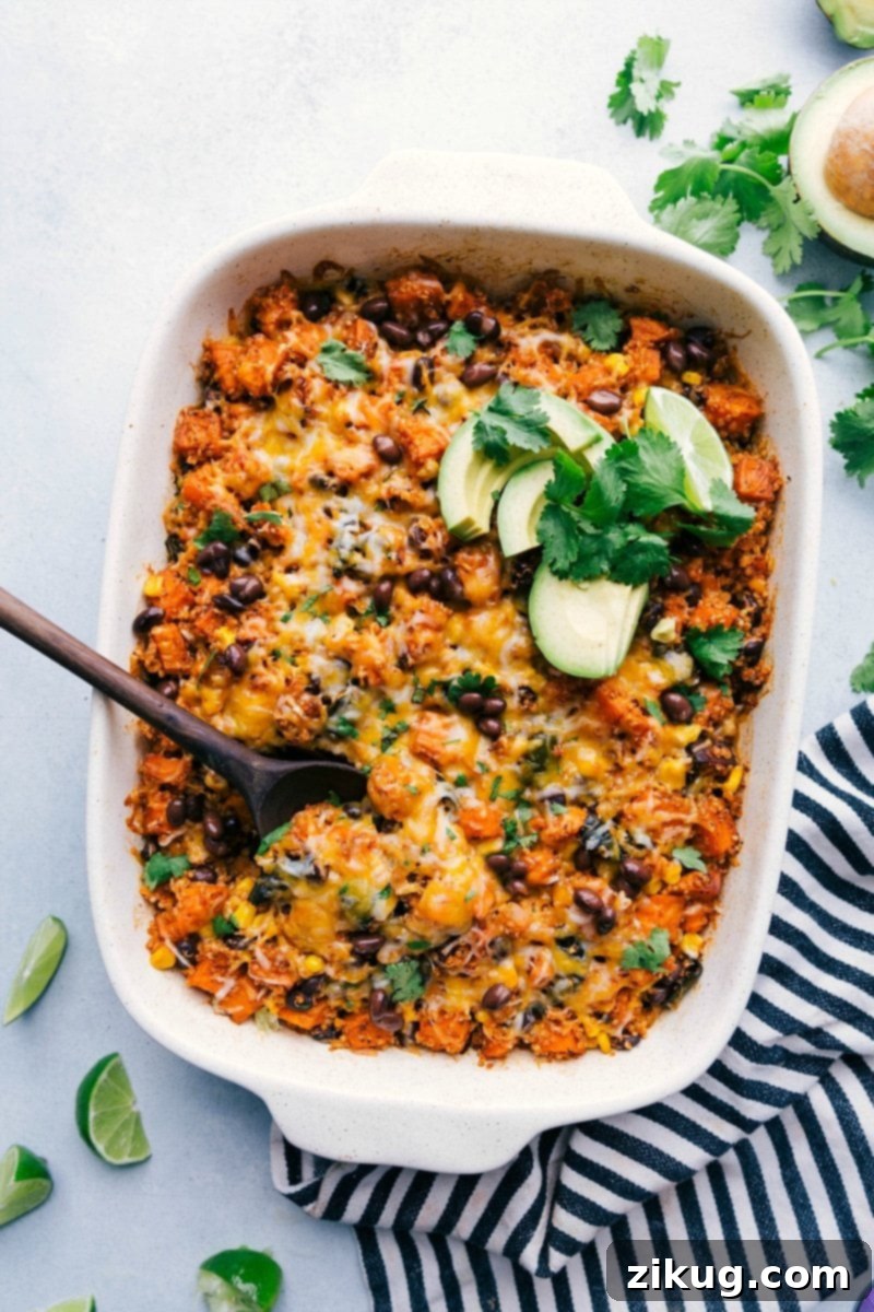 Freshly baked Quinoa Enchilada Bake, golden and bubbly.