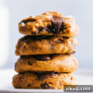 Stack of freshly baked golden-brown cake mix pumpkin cookies.