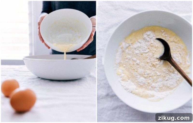 Butter and wet ingredients being added to the dry ingredients in a mixing bowl for the recipe.
