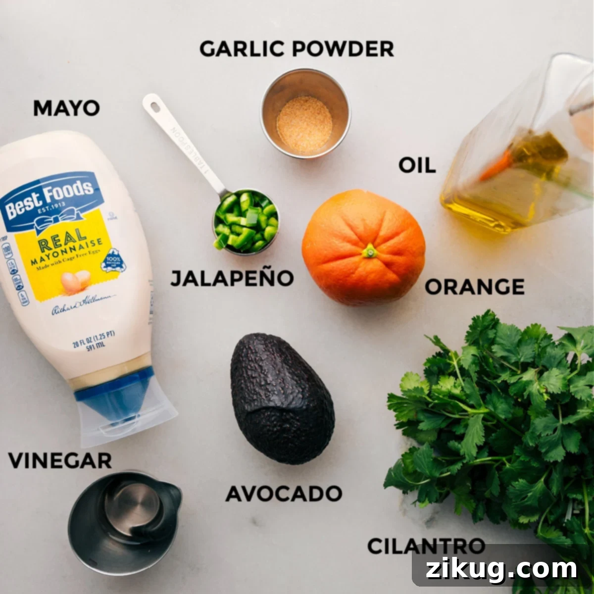 Creamy Avocado Sauce Ingredients for Chicken Rice Bowls All the creamy and fresh ingredients for the avocado sauce, prepped for blending to complement the chicken rice bowls.