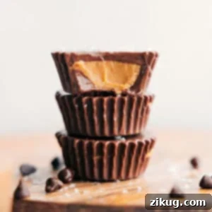 A perfectly crafted homemade peanut butter cup, showcasing its delicious layers and ready for a bite.