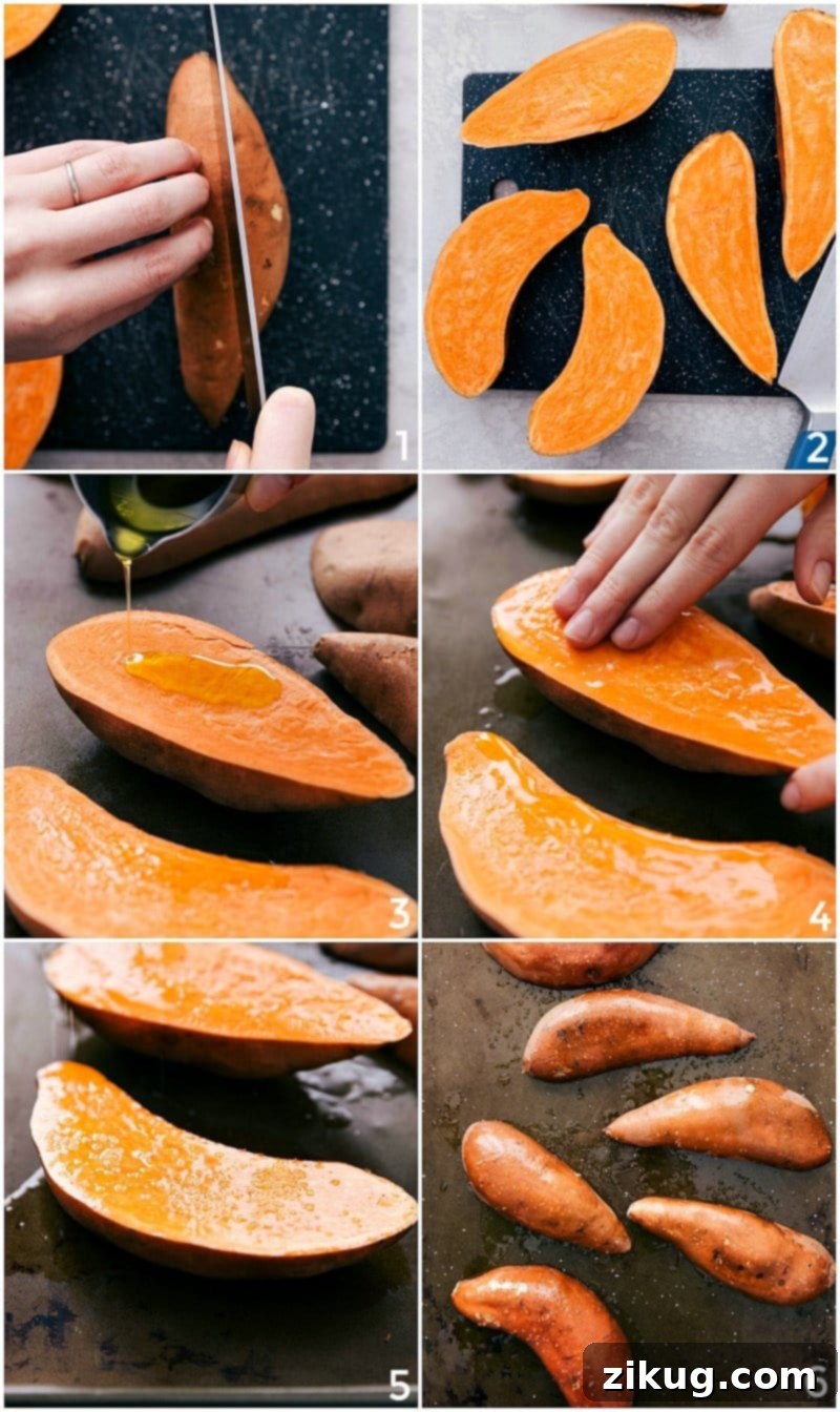 How To Make Baked Sweet Potatoes A pair of hands demonstrating the preparation of sweet potatoes, carefully cutting them in half lengthwise on a wooden cutting board, then drizzling with olive oil and seasoning with salt and pepper on a baking sheet.