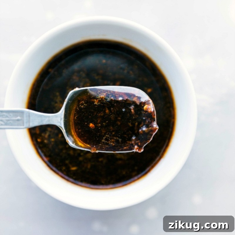 Flavor Fusion: Rich Sauce Ready to Enhance and Unite Dish Ingredients A rich and aromatic sauce, perfectly prepared and ready to be incorporated into the dish to unite and enhance all the ingredients.