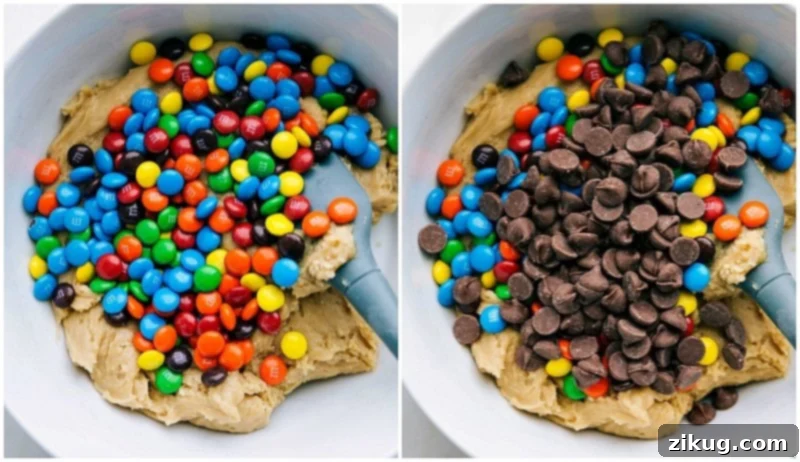 Colorful M&M candies and rich chocolate chips being folded into the prepared cookie dough, promising bursts of flavor and texture in every bite of this M&M cookie recipe.