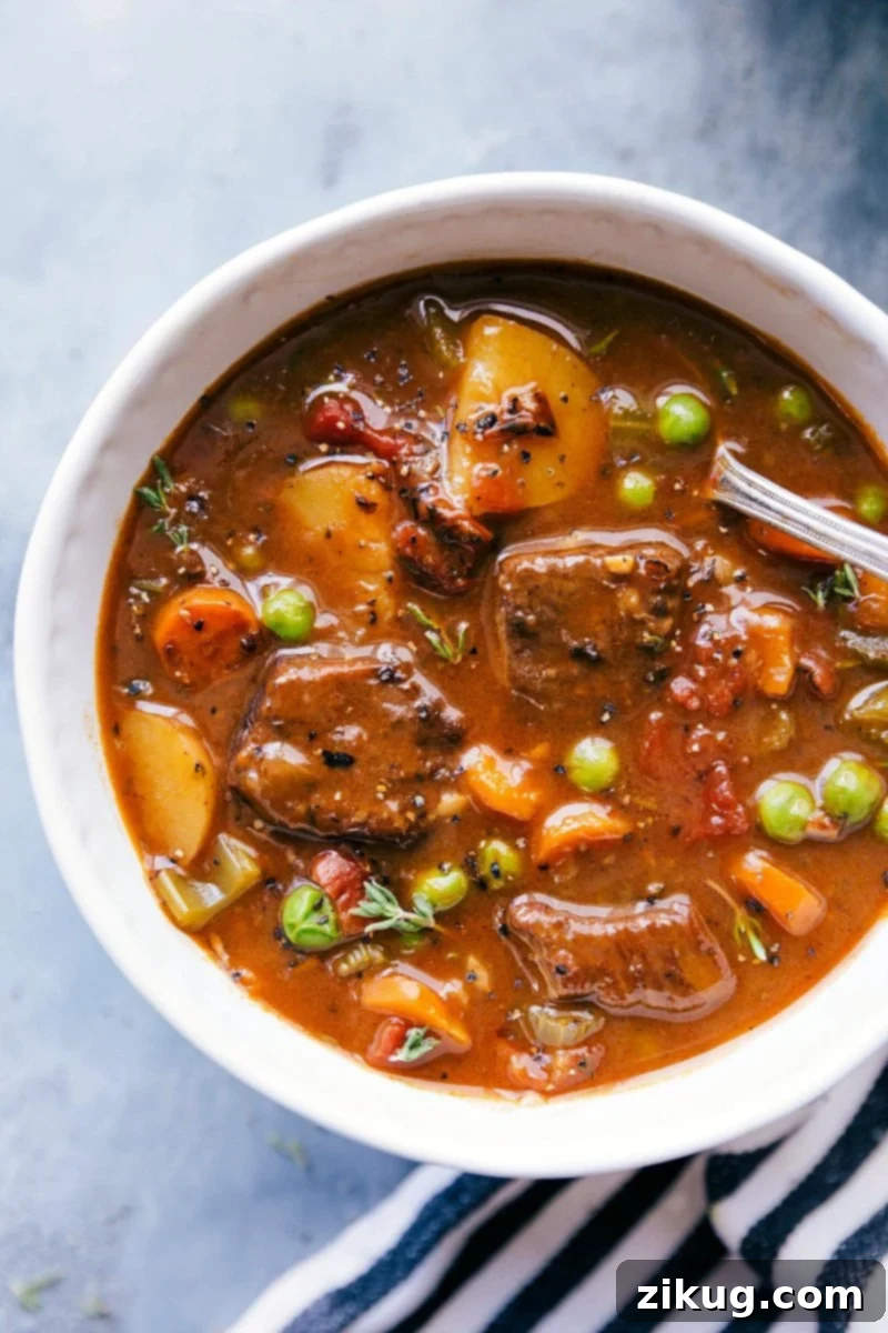 Hearty Instant Pot Beef Stew: Warm and Ready to Enjoy Hearty Instant Pot Beef Stew served in a rustic bowl, steaming and ready to be enjoyed, garnished with fresh herbs.