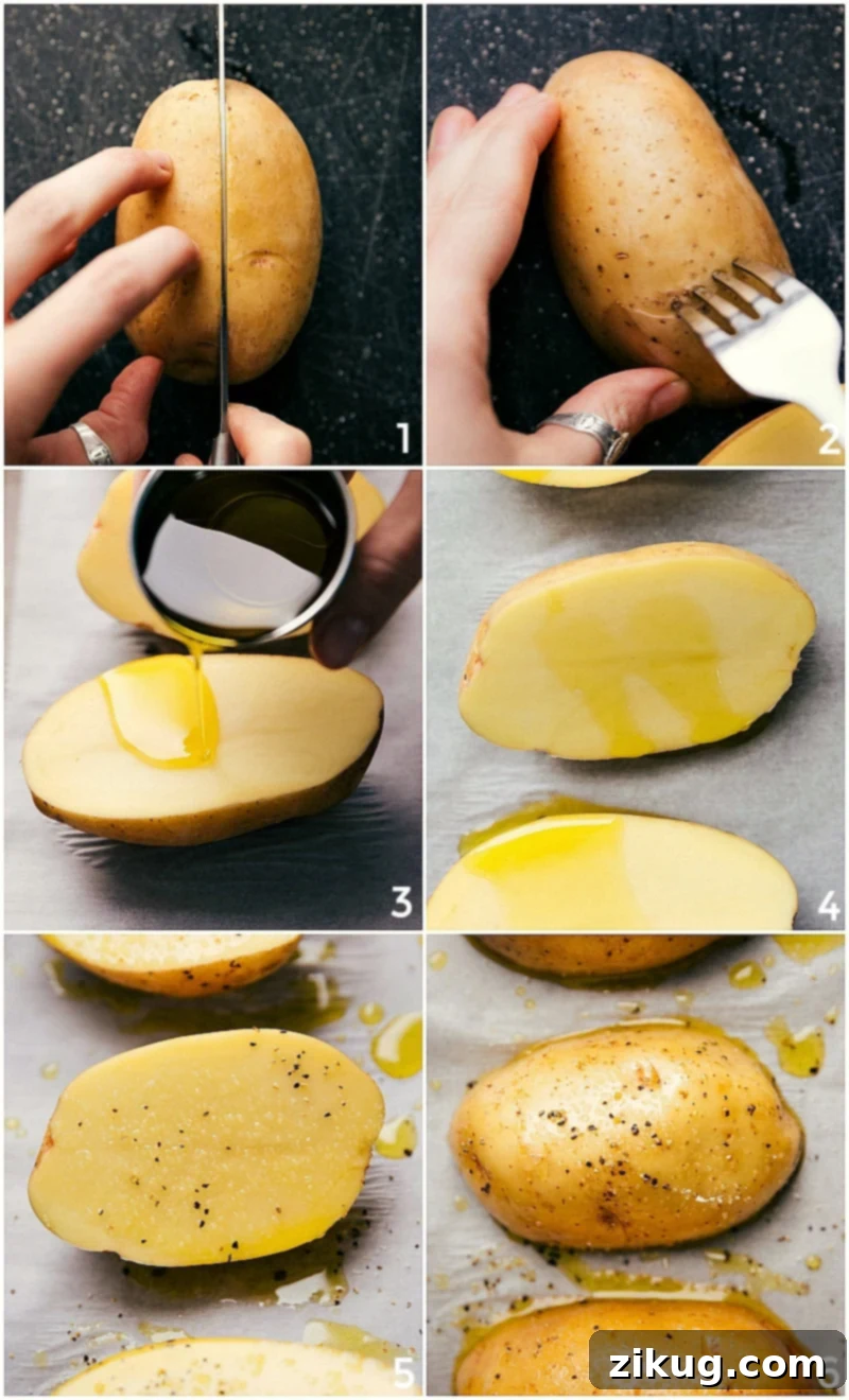 Effortless Baked Potato Perfection 2 Halved potatoes being prepared for baking with fork piercings, an oil rub, and a seasoning of salt and pepper, positioned cut-side-down on a baking pan.