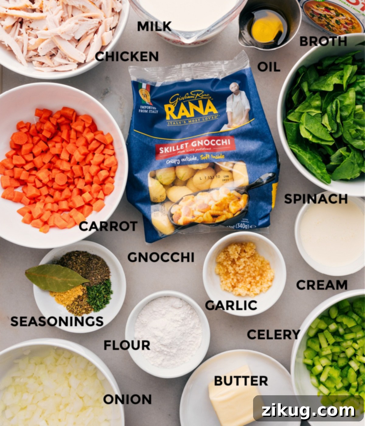 Essential Ingredients For Chicken Gnocchi Soup All the fresh ingredients for Chicken Gnocchi Soup are artfully arranged, including diced vegetables, gnocchi packages, chicken broth, milk, cream, garlic, and various seasonings, ready for assembly.