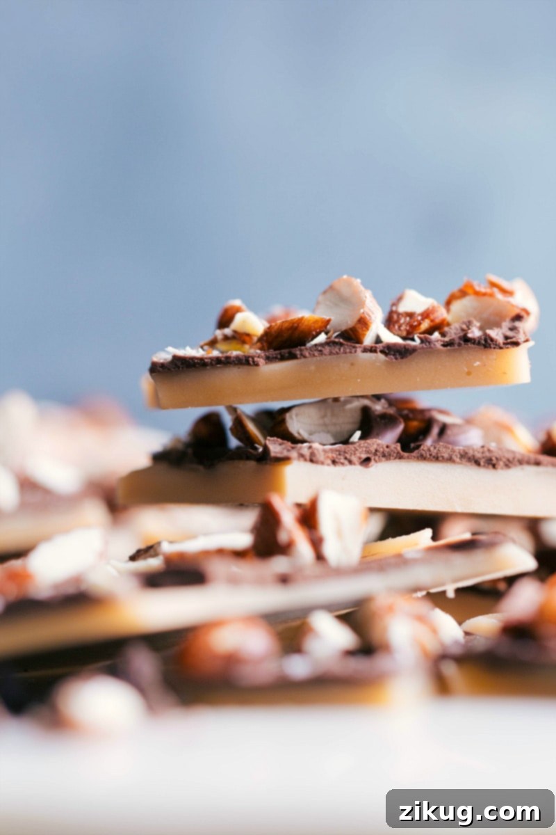 Layered toffee pieces stacked, showcasing their rich and crunchy texture.