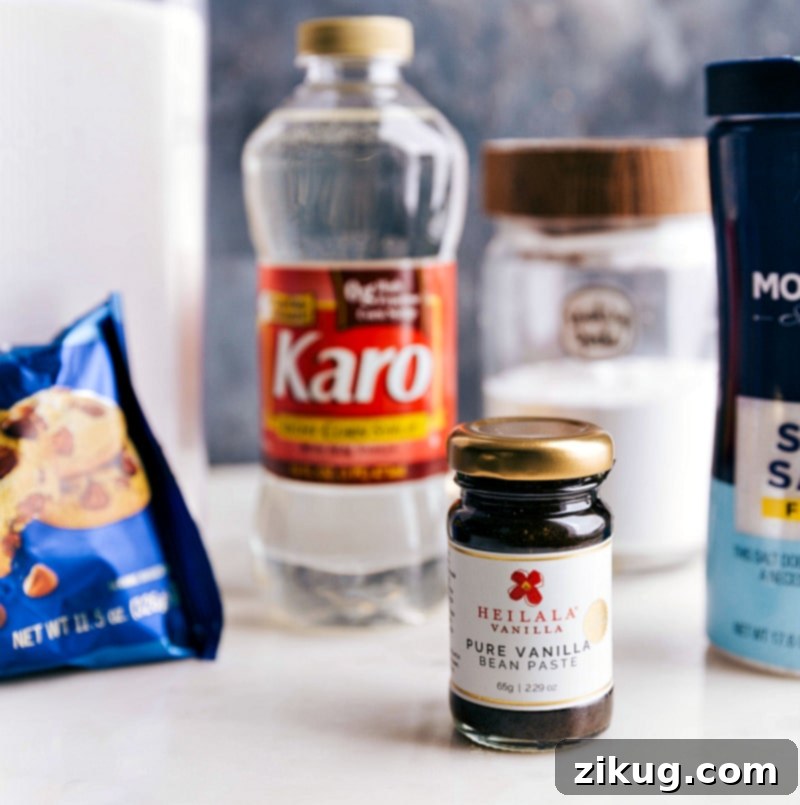 Ingredients laid out for making Honeycomb Candy: sugar, corn syrup, water, baking soda, vanilla, and salt