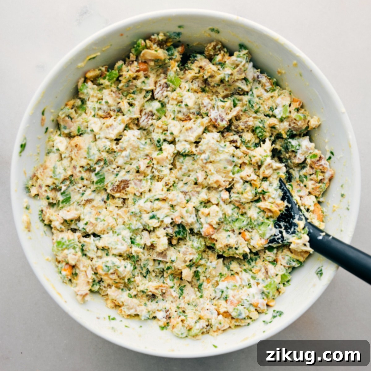 The Easiest And Best Curry Chicken Salad The vibrant Curry Chicken Salad, fully mixed and beautifully presented, ready to be served in a variety of ways, from lettuce wraps to sandwiches.