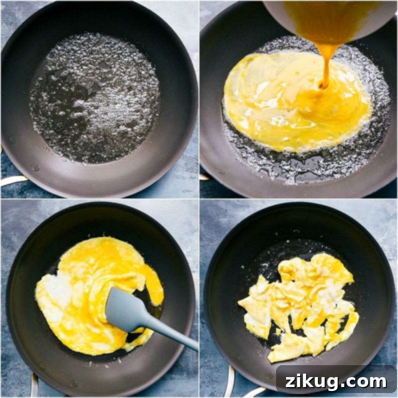 Cracked egg sizzling in a pan, being prepared for inclusion in a fried rice recipe, highlighting the cooking process.