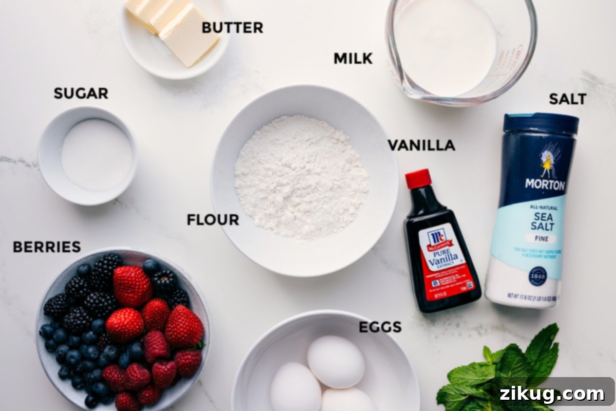 Ingredients In Dutch Baby All the essential ingredients for this Dutch Baby recipe are neatly prepped and ready for easy assembly, including cubes of butter, fresh milk, a pinch of salt, pure vanilla extract, all-purpose flour, granulated sugar, a vibrant selection of berries, and farm-fresh eggs.