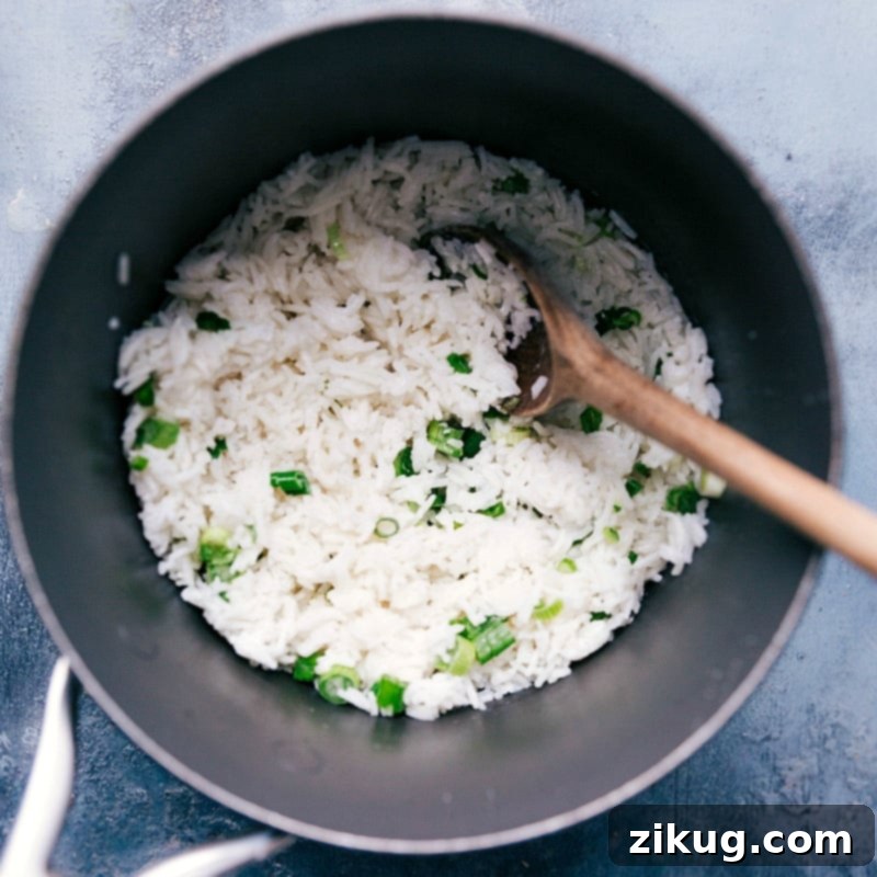 Aromatic Coconut Rice: The Heart of Our Vegetarian Lettuce Wraps Perfectly cooked, fluffy coconut rice, an essential component for the vegetarian lettuce wrap filling.
