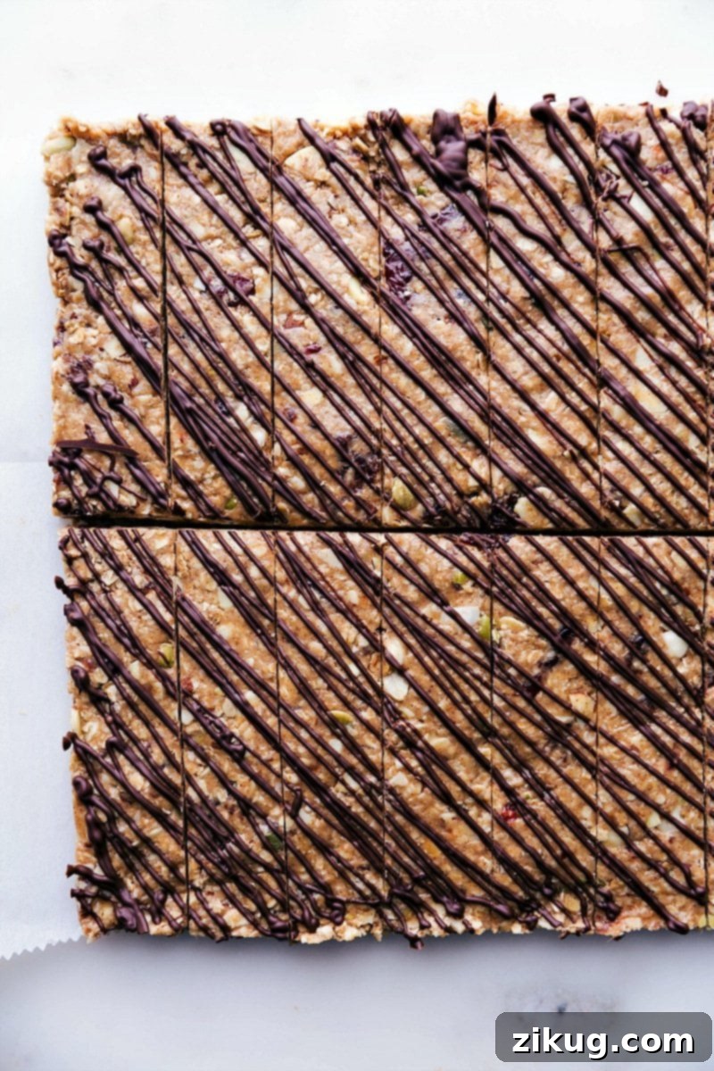 Delicious No-Bake Granola Bars with Chocolate Drizzle Gorgeous no-bake granola bars with chocolate drizzled over the top, ready to be enjoyed.