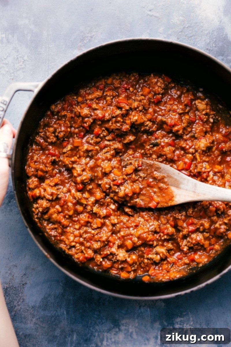 Serving Ready Turkey Sloppy Joes: A Hearty Meal A serving of hot Ground Turkey Sloppy Joes, ready to be spooned onto toasted buns, with a rich, savory sauce.