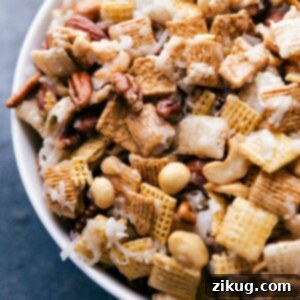 Addictive Sweet Chex Mix 2 Completed sweet chex mix recipe displaying all ingredients thoroughly coated in delicious sugar sauce.