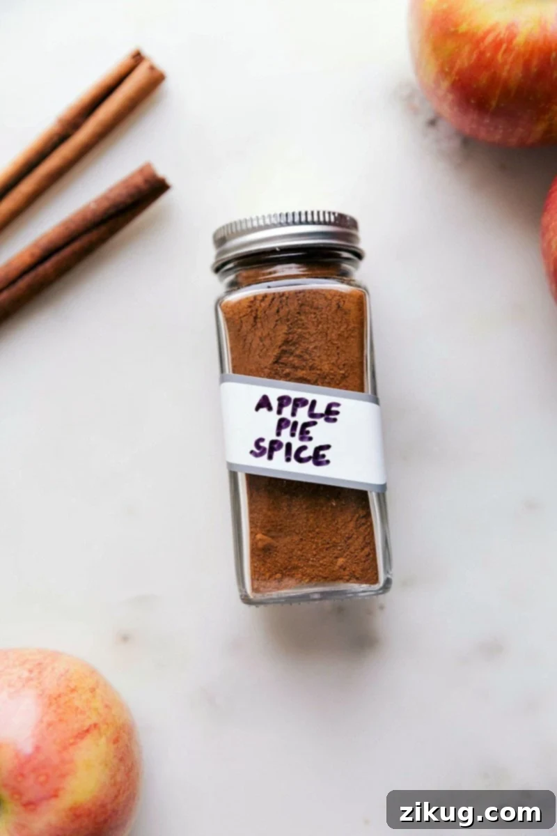Container of fragrant apple pie spice, a versatile spice blend.