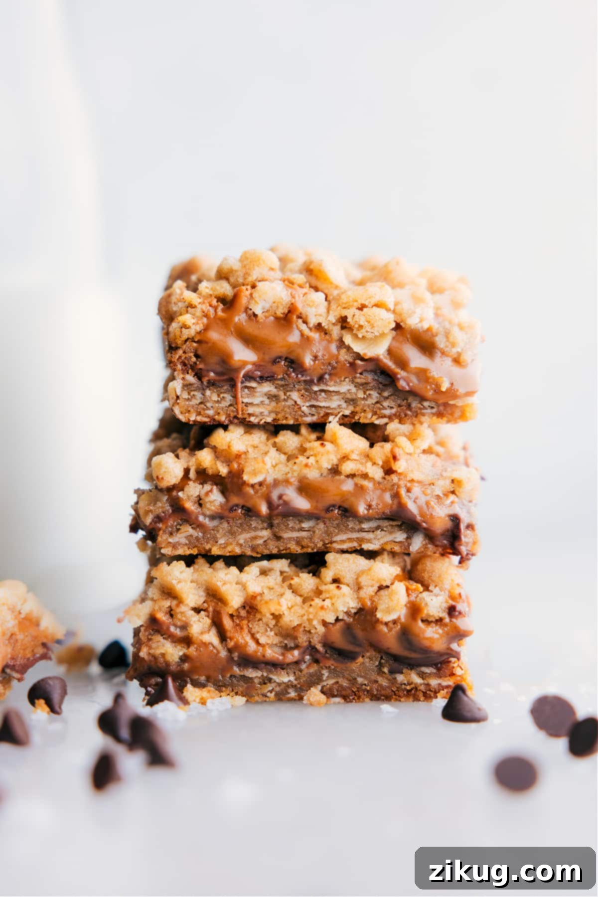 The best Cookie Butter Bars recipe Cookie Butter Bars stacked on top of each other.