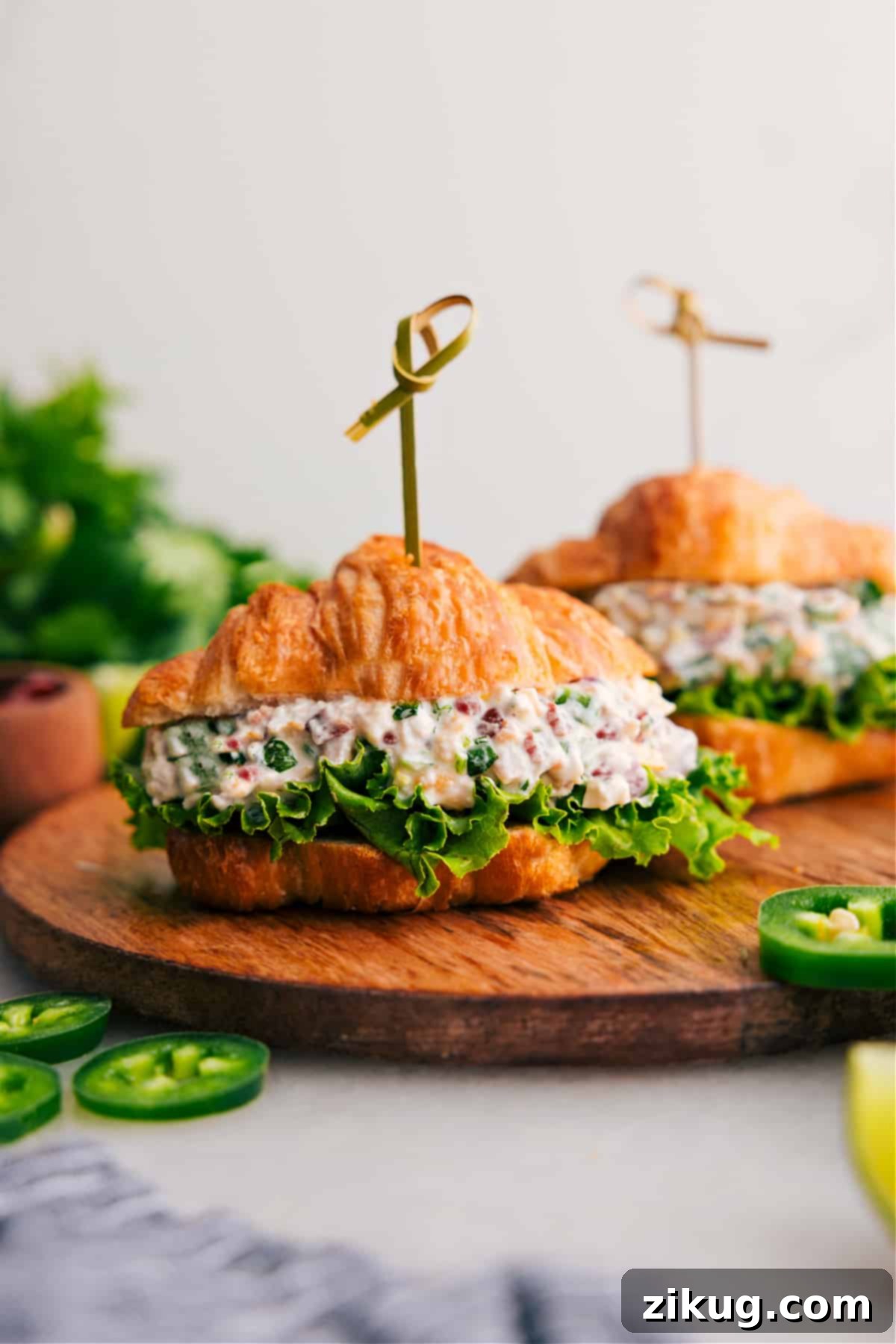 The Best Jalapeño Popper Chicken Salad Jalapeño Popper Chicken Salad in a croissant is ready for you to enjoy. A perfect blend of spicy and creamy flavors.