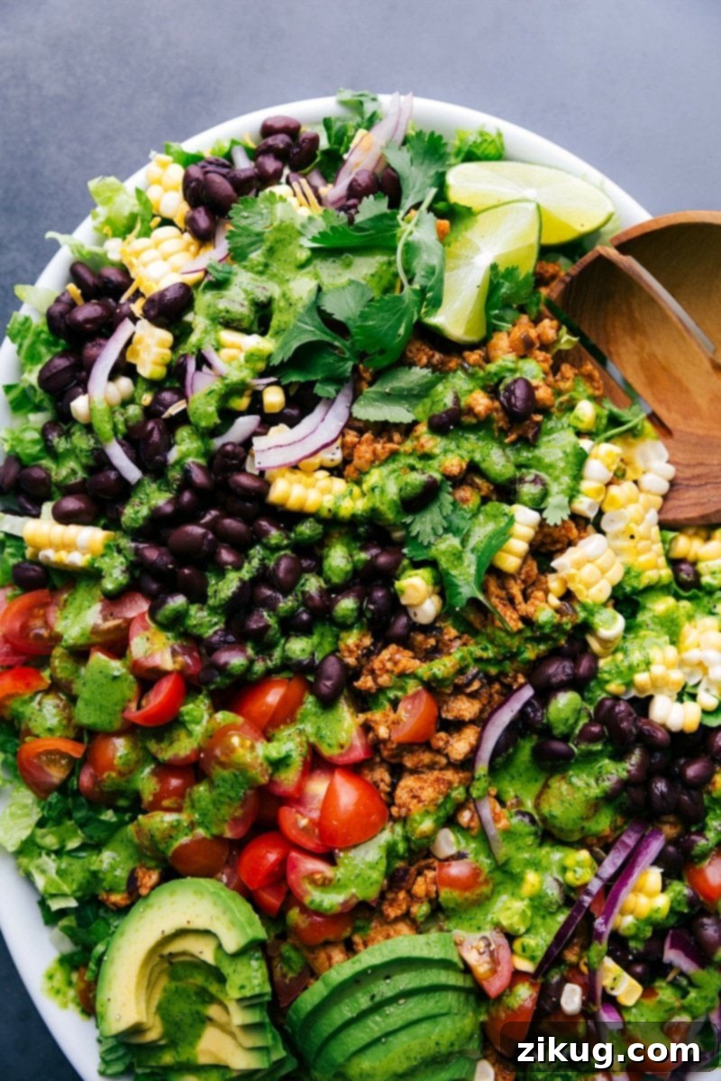 Chicken Taco Salad bursting with colorful, nutritious ingredients.