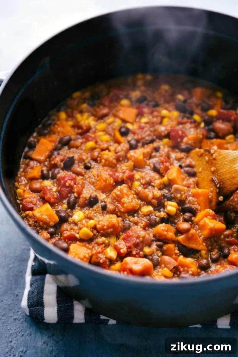Hearty Quinoa Chili: A Delicious and Wholesome One-Pot Meal A steaming pot of Quinoa Chili, showcasing its rich texture and vibrant colors, ready to be served as a comforting meal.