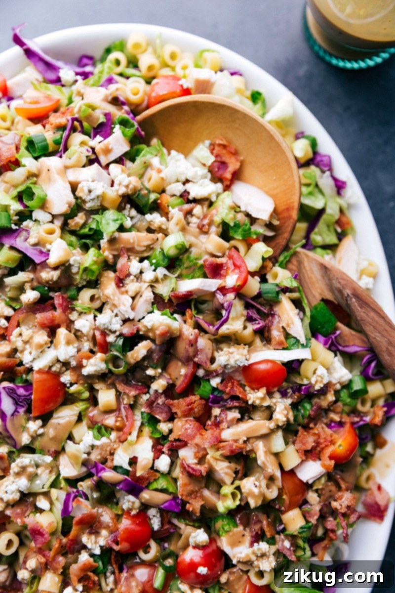 Delicious Portillo's Chopped Salad The finished, dressed Portillo's Chopped Salad on a platter, ready to be served.