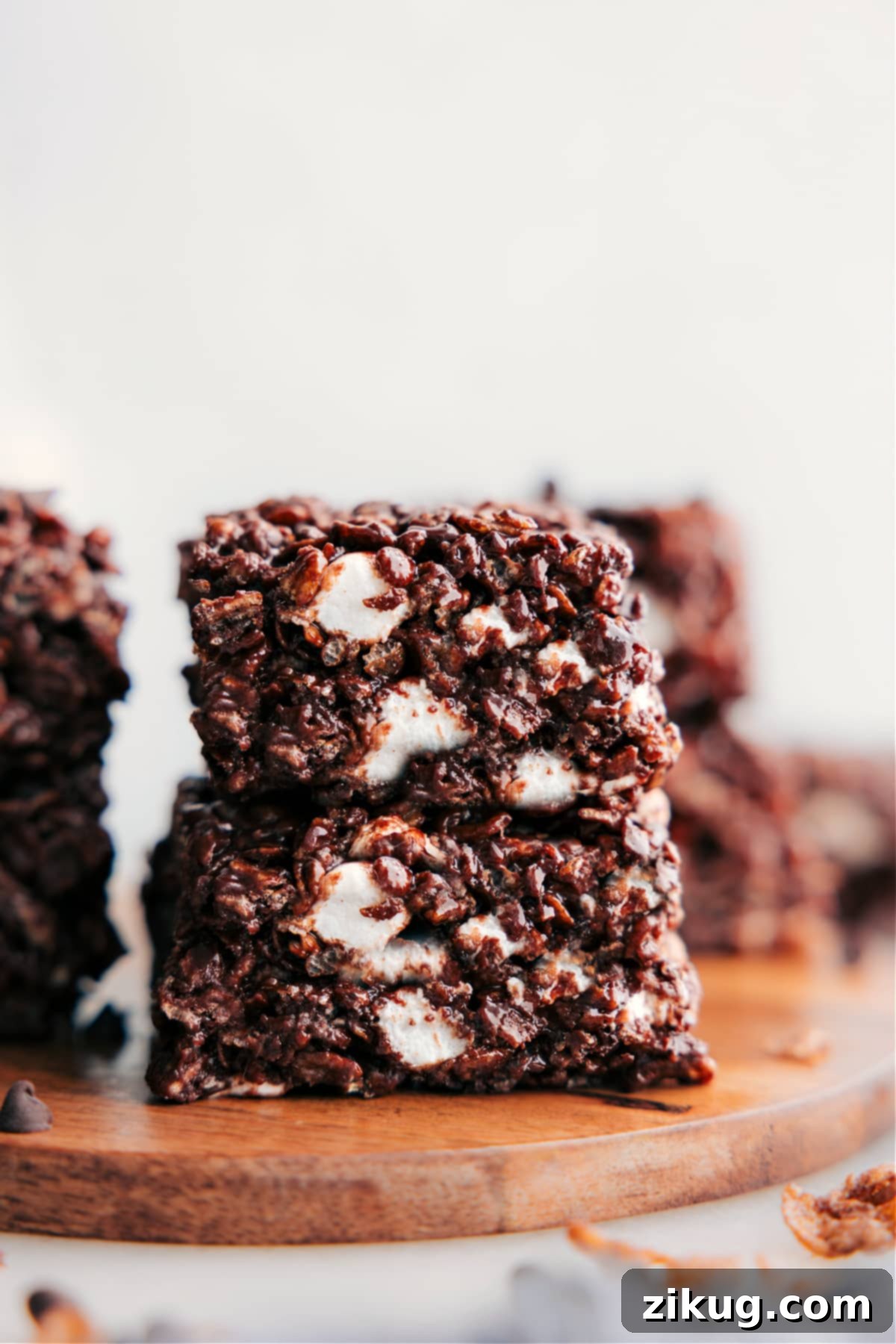 Delicious Chocolate Rice Krispie Treats for Any Occasion Delicious chocolate Rice Krispie Treats cut into squares and stacked, ready to be enjoyed.